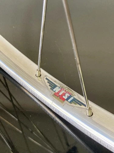 Ruota anteriore corsa, mozzo Campagnolo Record, cerchio Nisi tubolare.
